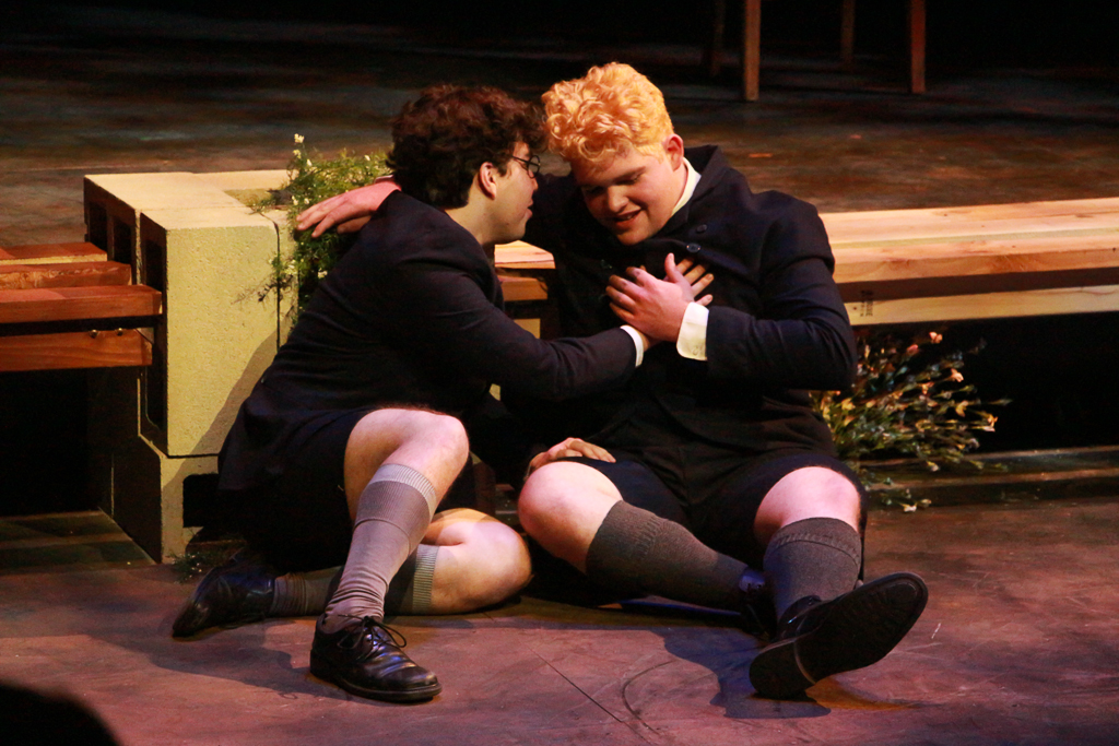 Ben Monts as Hanschen presses Ernst's hand, played by Alex Contreras, to his heart in the Spring Awakening dress rehearsal Feb 24. Christopher Jones/The Telescope