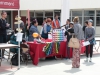 Students visit the LGBT booth in the SU Quad during the Springfest on April 14. Christopher Jones/The Telescope