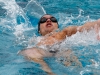 Palomar's Neal Gorman swims the men's 100-yard backstroke at the swim meet against Grossmont on April 8 at the Wallace Memorial Pool. Gorman placed first with a time of 2.07.86. Coleen burnham/The Telescope