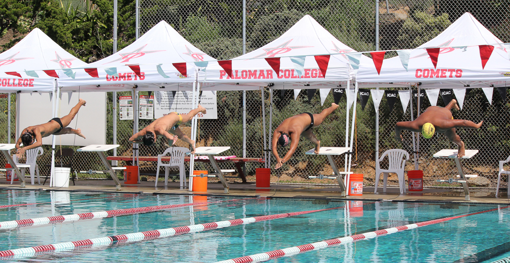 German Rodarte, Jarquin Martin, Naone Hasenstab and Freddy Gonzalez (l to r) dive off the block to start the men’s 1000-yard freestyle at the swim meet between Palomar and Grossmont on March 17 at the Wallace Memorial Pool. Grossmont men won the meet 136.5 -103.5. Coleen Burnham/The Telescope