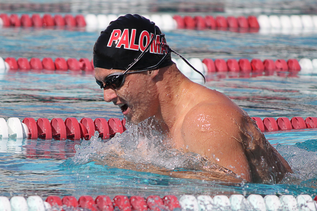 Jach Wagonis swim the men’s 200-yard breastroke at the swim meet between Palomar and Grossmont on March 17 at the Wallace Memorial Pool. Wagonis placed first with a time of 2:33.83 but the men lost the meet overall with a score of 136.5 - 103.5. Coleen Burnham/ The Telescope