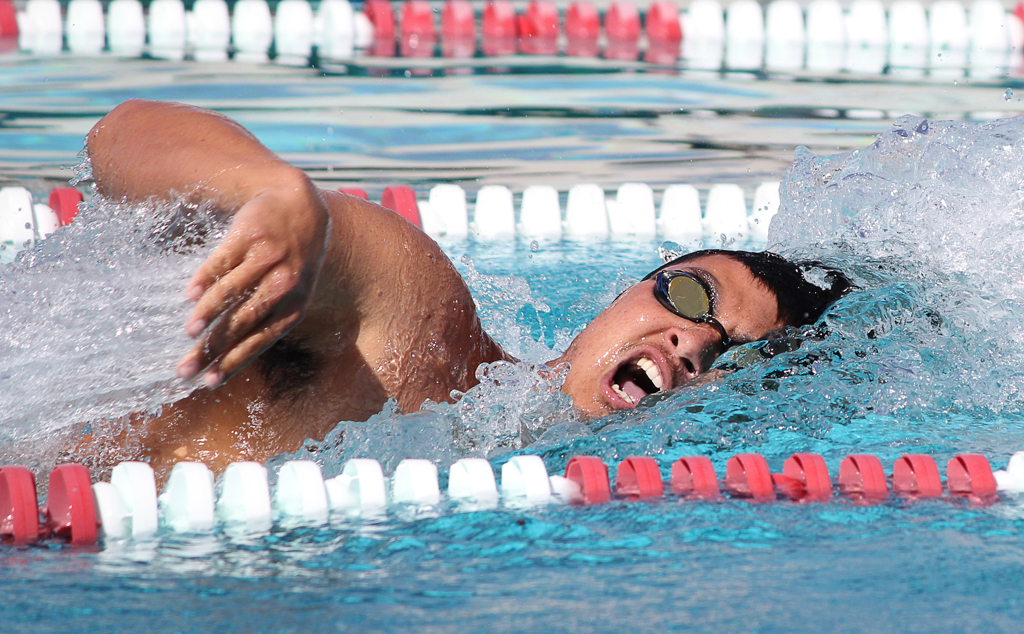 Palomar's Allen Klein swims the men’s 200-yard freestyle at the swim meet between Palomar and Grossmont on March 17 at the Wallace Memorial Pool. Klein placed first with a time of 1:55.25 but the men lost overall 136.5 - 103.5. Coleen Burnham/ The Telescope