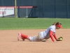 Palomar short-stop Brooke Huddleson (4) makes a diving catch during the April 13 game against Southwestern College. Comets won 8-0. Tracy Grassel/The Telescope