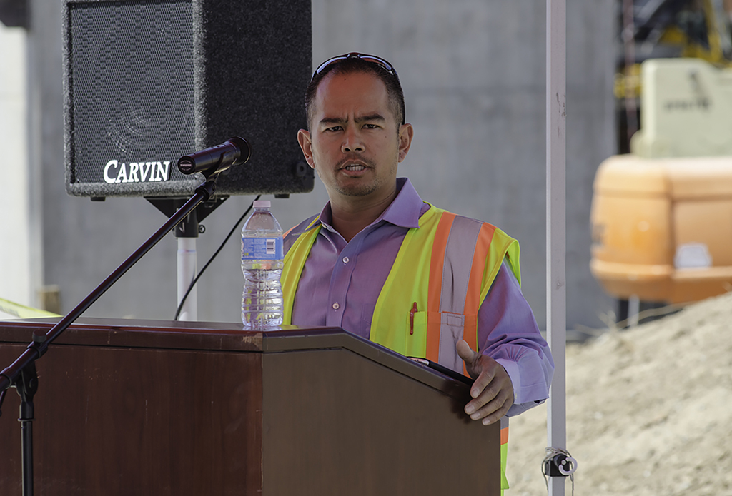 Gilbane's Executive Project Manager Alex Alon gives a speech during the Topping Out Ceremony which was held on the San Marcos campus July 28. The Ceremony was commemorating the construction of Palomar's new Library/Learning Resource Center by hoisiting the last beam and bolting it into it's final place. The expected completion date is June of 2018. Tracy Grassel/The Telescope