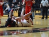 Palomar guard Shelby Ricker (52) fights over a loose ball with Imperial Valley forward Charlene Charles (4) during the Feb. 10 game at the Dome. Palomar defeated Imperial Valley 87-23. Tracy Grassel/The Telescope