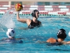 Palomar’s Sydney Thomas (4) scores goal while being guarded by San Diego Mesa player Lauren Matthews (8) on Oct.19 at Wallace Memorial Pool. The Comets lost to defending state champion San Diego Mesa 5 to 9. Melissa Rodas/The Telescope