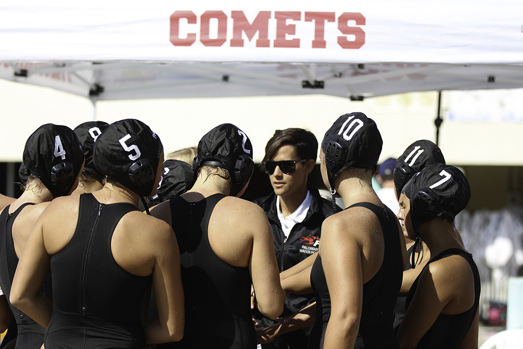 Palomar's Head Coach Jackie Puccino gives pep talk before the game agasint Miramar. Palomar won 9-4 against Miramar on Oct. 12 at the Wallace Memorial Pool. Kayla Rambo/The Telescope