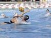 Palomar's Dallas Fatseas (8) throws ball past opponent Emily Johnson (20) to score fourth goal of the game. Palomar won 9-4 against Miramar on Oct. 12 at the Wallace Memorial Pool. Kayla Rambo/The Telescope