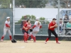 Palomar's Tayler Moore (11) scores on a 4th inning double by Katy McJunkin (not shown) on March 11 against Mt. San Jacinto College. The Comets won the game in 5 innings with a score of 9-1. Stephen Davis/The Telescope