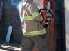 Cadet Lippert practices cutting bolts at Palomar's Fire Academy on Sept 30. Christopher Jones / The Telescope