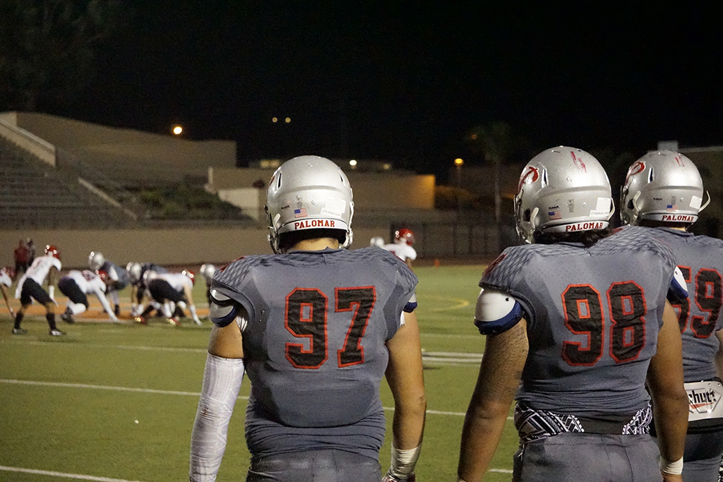 Deffensive Lineman Anthony Zuniga (97) and Nick Zimmerman (98) watch as Palomars offense charges towards the goal line on Sept. 30. Anthony Cole/ The Telescope