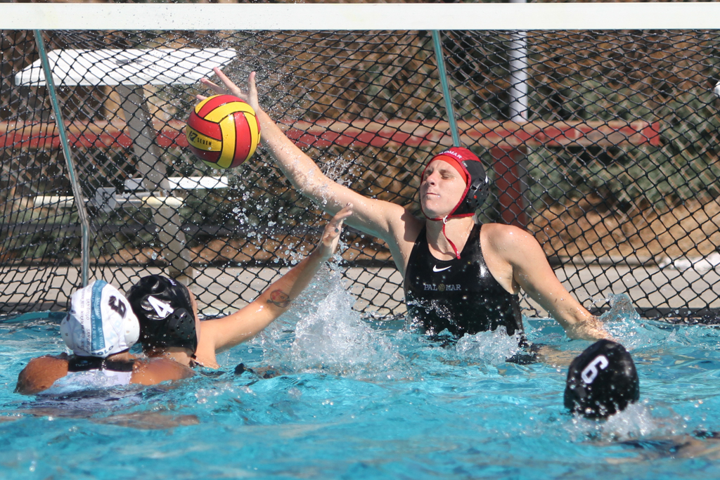 Palomar's Jordann Heimback defends the goal during the game against San Diego Miramar on Oct. 11 at Wallace Memorial Pool. Final score was Palomar 12 and San Diego 7. Julie Lykins / The Telescope
