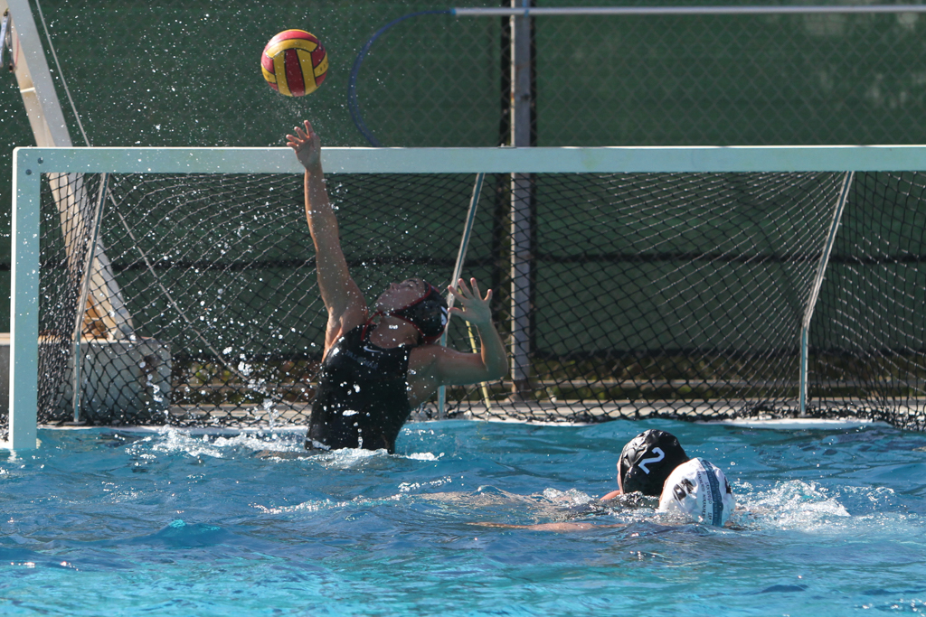 Palomar's Skylar Buckland defends the goal during the women's water polo game against San Diego Miramar on Oct. 11 at Palomar College. Final Score was Comet's 12 and Miramar 7. Julie Lykins / The Telescope