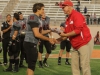November 22, 2014 | Palomar Punter #60 Codey Wuthrich accepts the Palomars’ Player of the Game award from Palomar Athletic Director Scott Cathcart. Wuthrich punted eith times for an average of 42 yards, the longest being 54yards. The Comets went on to defeat the Vaqueros 30-22 and win the Patriotic Bowl at Escondido HS, in Escondido California. Photo: Philip Farry | The Telescope