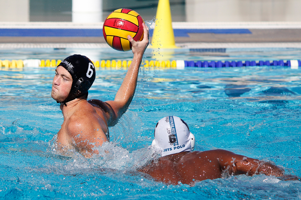 Palomar's Michael Murray (6) gets ready to pass the ball during the Men's Water Polo PCAC Conference game between Palomar and Miramar on Nov. 4 at the Ned Baumer Pool. Miramar's Akhil Perimbeti (6) looks on. Palomar men won 22-12. Coleen Burnham/The Telescope