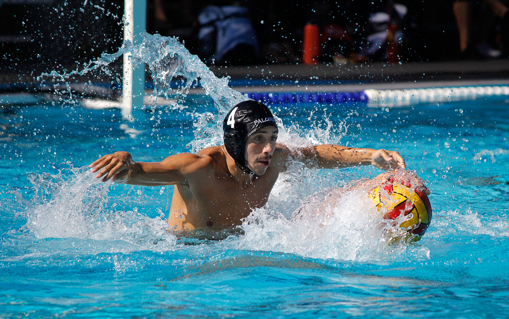 Palomar's Conner Chanove (4) fights for the ball during the Men's Water Polo PCAC Conference game between Palomar and Miramar on Nov. 4 at the Ned Baumer Pool. Palomar men won 22-12. Coleen Burnham/The Telescope