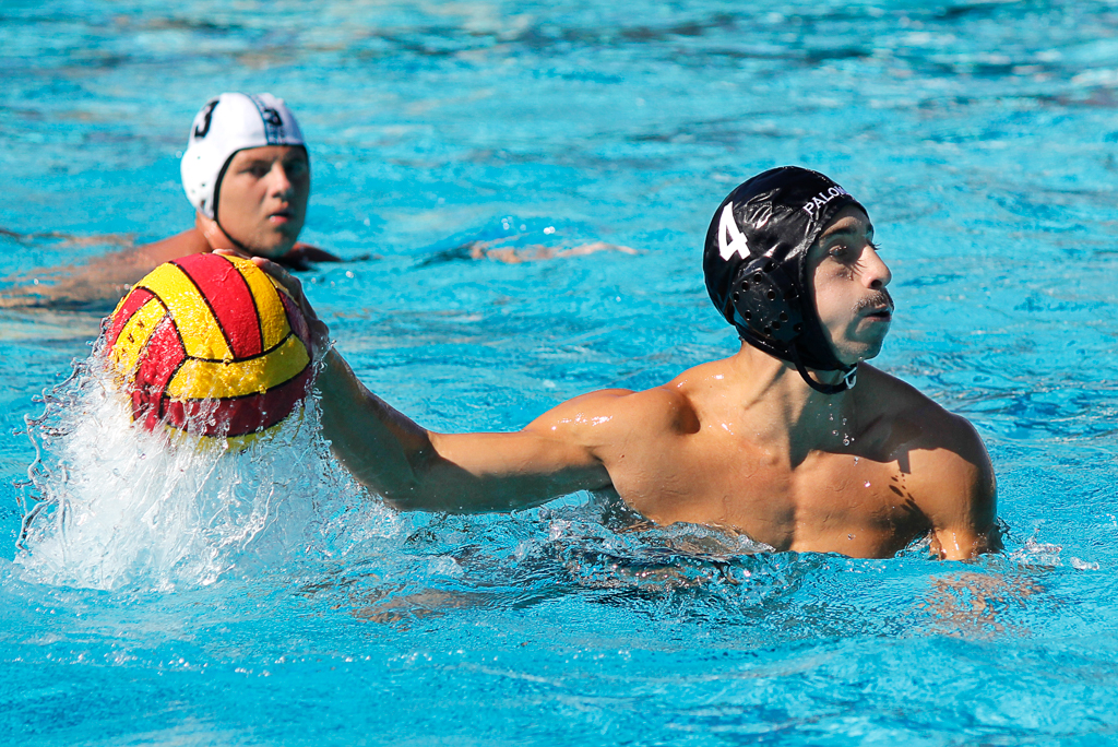 Palomar's Conner Chanove (4) looks to pass the ball during the Men's Water Polo PCAC Conference game between Palomar and Miramar on Nov. 4 at the Ned Baumer Pool. Miramar's Ryan Baines (3) looks on from behind. Palomar men won 22-12. Coleen Burnham/The Telescope