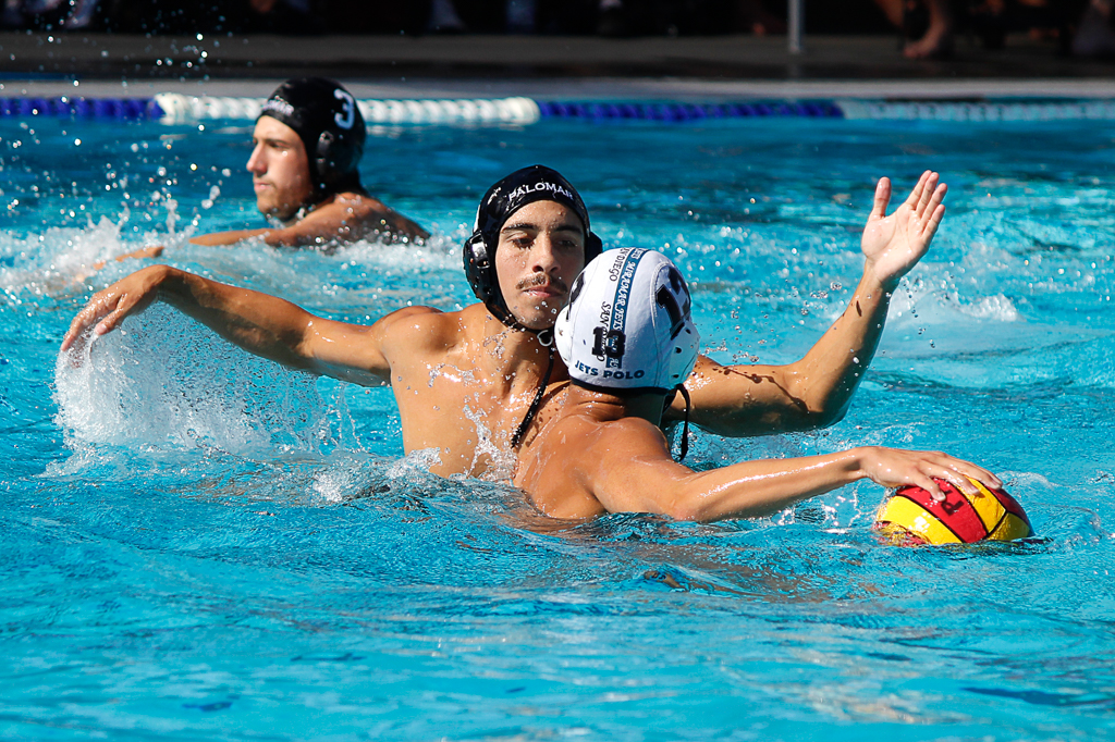 Palomar's Conner Chanove (4) defends the ball against Miramar's Vasco Salcedo (13) during the Men's Water Polo PCAC Conference game between Palomar and Miramar on Nov. 4 at the Ned Baumer Pool. Teammate Eli Foli (3) is in back. Palomar men won 22-12. Coleen Burnham/The Telescope