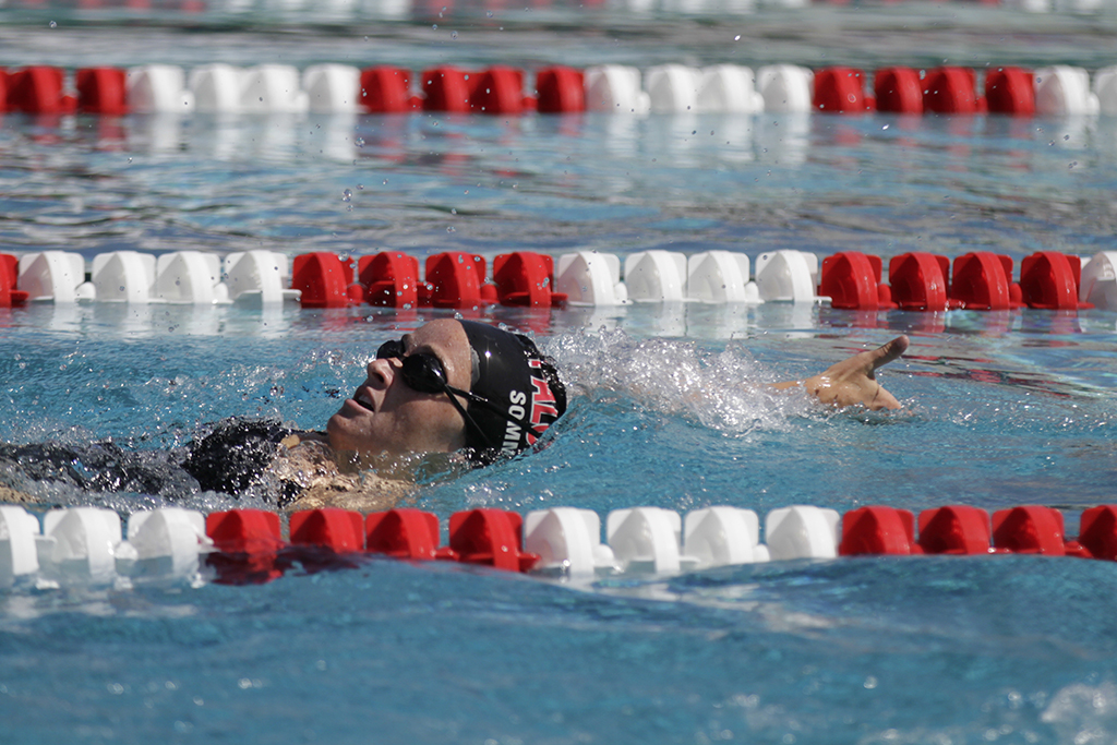 Palomar’s Chelsea Sommer swims the 100 yard Saturday April 18 at the Wallace Memorial Pool. The Comets hosted the 2015 Pacific Coast Athletic Conference Men’s/Women’s swimming-diving championships. Philip Farry / The Telescope.