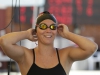 Palomar’s Kendyl Mundt adjusts her goggles prior to the start of the 200 yard butterfly held April 18 at the Wallace Memorial Pool. The Comets hosted the 2015 Pacific Coast Athletic Conference Men’s/Women’s swimming-diving championships. Philip Farry / The Telescope.