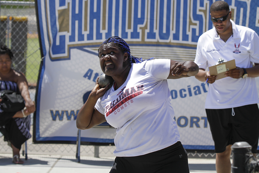 Palomar’s De’ondra Young launches the shot put during the Pacific Coast Athletic Conference Track and Field Championship held at Mesa College April 18. Young won the event with a throw of 37 feet. Philip Farry / The Telescope.