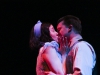 Jim O'Connor (right, performed by Ryan Balfour) surprises Laura (left, performed by Abby Fields) with a kiss in the dress rehearsal of The Glass Menagerie by Tennessee Williams playiing at Palomar College. Lucas Spenser/Telescope.