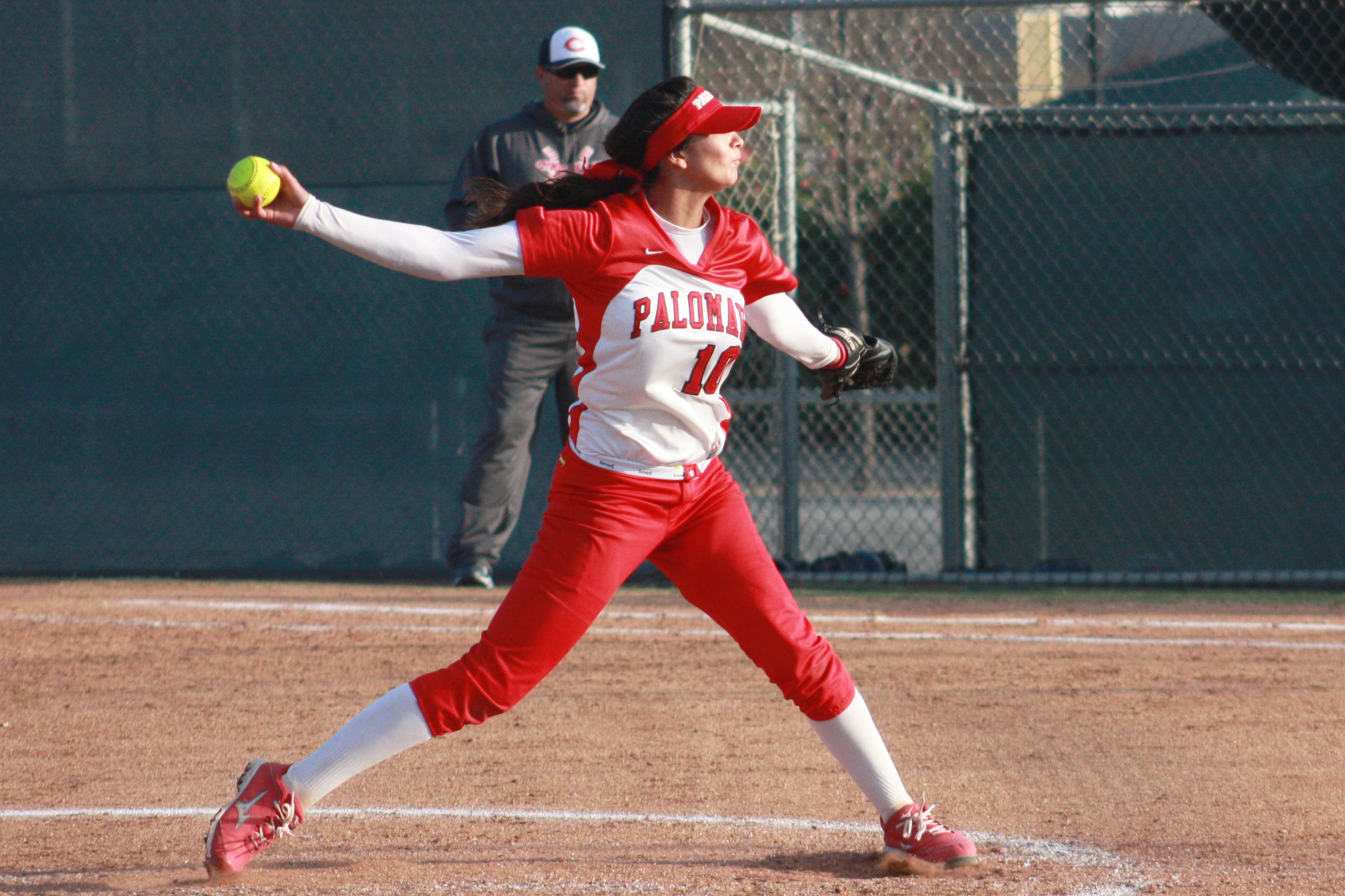 Palomar relief pitcher Kristina Carbajal throws a pitch against Citrus College on Feb 25 at Palomarâs softball field. Carbajal pitched the last 3 inning and didnât give up a run in the Comets 4-1 win over the Owls. The win was the 8th win in a row for the Comets. Scott Colson/The Telescope