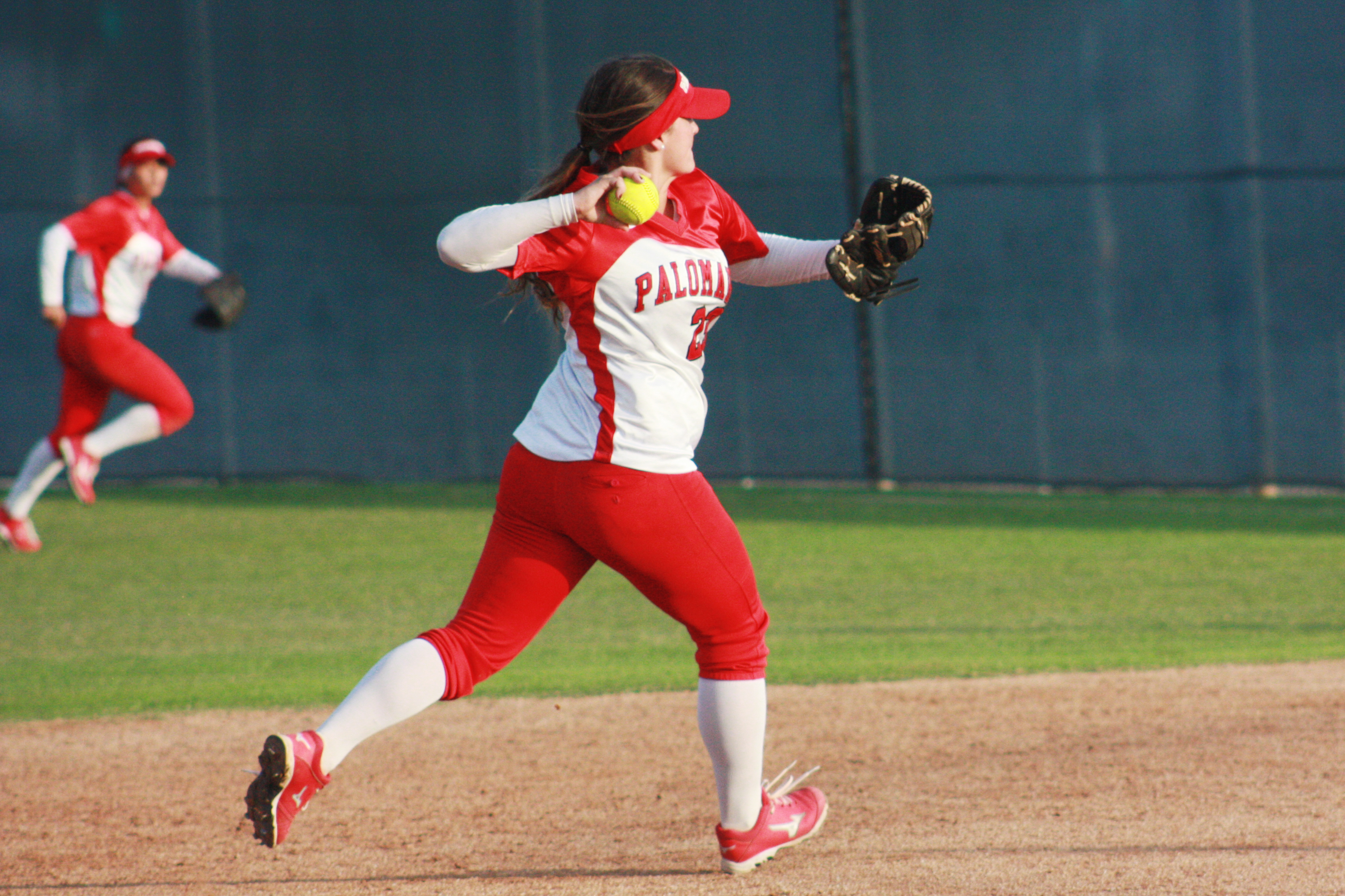 Palomar shortstop Kali Pugh fields a ground ball and throws to first baseman Paige Falconeiri against Citrus College on Feb 25 at Palomarâs softball field. The Comets picked up their 8th win in a row to improve their record to 9-1 on the season in their 4-1 win over the Owls. Scott Colson/The Telescope