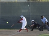 February 11, 2015 | Palomar third baseman #25 Iesha Hill hits one of her two hits. The Comets beat the Olympians 12-2 in six innings and improving their record to 7-1-1 and 1-0 in the PCAC. Philip Farry / The Telescope