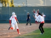 February 11, 2015 | In the sixth inning with her teammates cheering her into home Stephanie Koishor #13 runs in the game winning score against San Diego Mesa College. The comets beat the olympians 12-2. Seth Jones / The Telescope