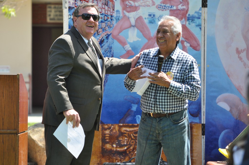 Palomar College President Robert Deegan receives recgnition from Chicano Studies Professor John Valdez during the Civil Rights Festival held in the Student Union Quad Wednesday, April 16, 2014. President Deegan was regognized for his support of the multicultural department. Monica Dattage/The-Telescope
