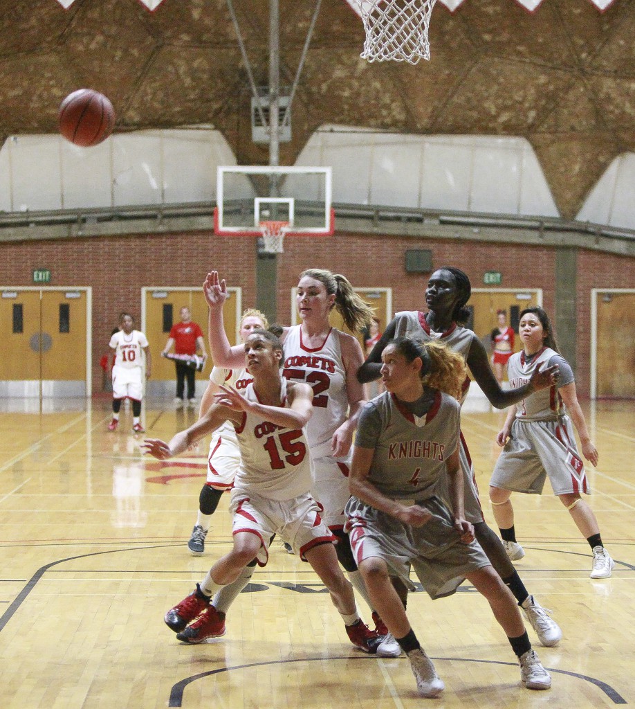 January 17, 2014 | Bianca Littleton (15) of Palomar goes after a rebound during game against San Diego City College at The Dome. Palomar won the game 97-83, Littleton scored 11 points. /PHOTO CREDIT: Stephen Davis/Copyright 2014 The Telescope