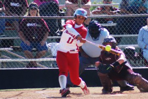 Palomar outfielder Keilani ‘KK’ Fronda launches her second homerun of the game in the 4th inning against Southwestern College on April 16 at Palomar’s softball field. Fronda went 4-4 with 2 homeruns, a double, and 5 RBI’s in the Comet’s 11-3 win over the Jaguars. The win improved Palomar’s conference record to a perfect 16-0 record with one conference game left. Scott Colson/The Telescope