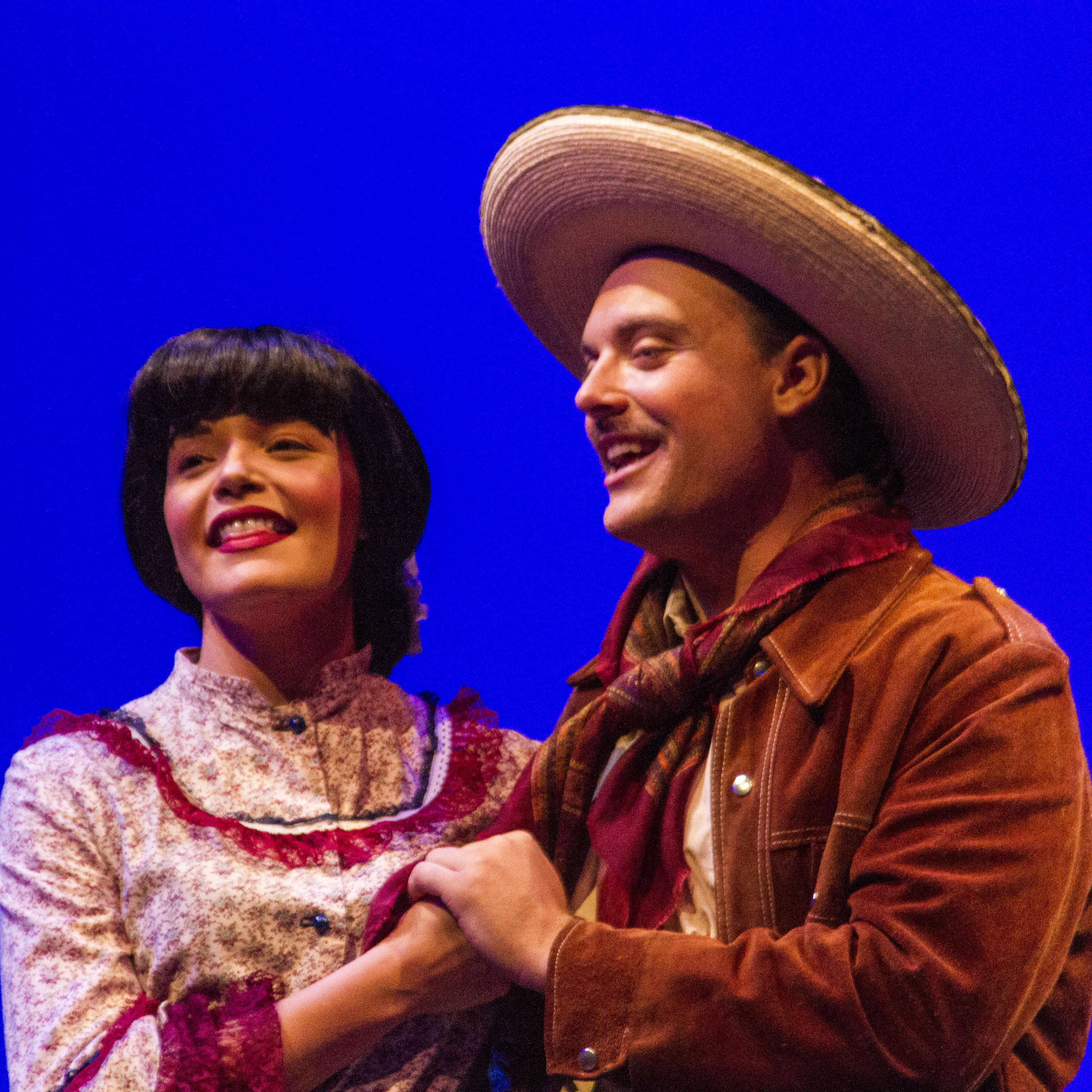 Ramona, played by Camilla Aguilar (l), and Sixto, played by Morgan Phillips (r), sing a song at the thirteenth birthday party of their daughter Esperanza; during the dress rehearsal of Esperanza Rising in the Studio Theatre at Palomar College Thursday April 24, 2014. (Lucas Spenser/The Telescope)