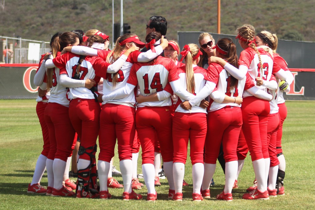 Palomar’s softball team huddle up after beating Imperial Valley College 25-0 on April 23 at Palomar’s softball field.  The Comets’ offense scored a season high 25 runs, in part to a combined 5 home runs and 15 RBI’s from outfielder Keilani ‘KK’ Fronda and third baseman Maci Lerno, and perfect pitching performances from Dani Cowan, Maci Lerno, and Kristina Carbajal. The win over the Arabs gave the Comet’s a perfect 18-0 conference record for the first time since 2005. Scott Colson/The Telescope