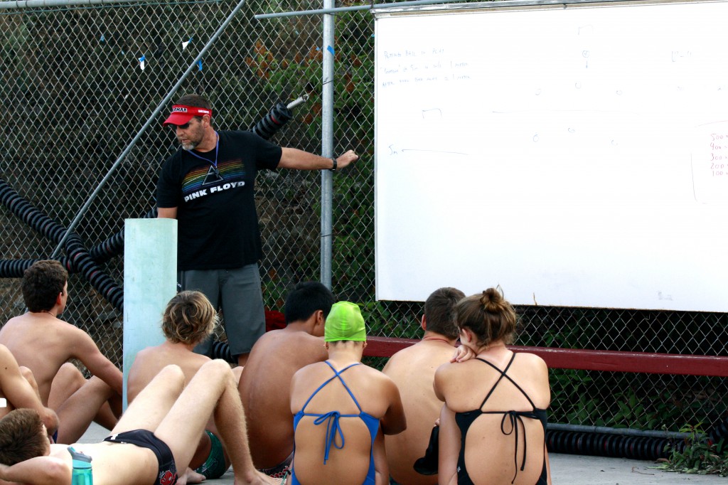 Palomar men's water polo coach Chad Aronen goes over strategy with both teams during a joint practice. Harim Arjon/The Telescope