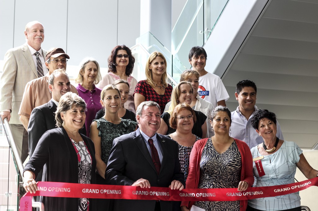 President Deegan posing with Palomar staff before the ribbon cutting ceremony at the Grand Opening of Palomar's new building on Oct. 10. Photo: Gerald Tovar/Telescope