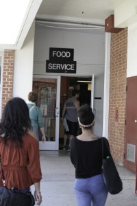 Students file through the Cafiteria Entrance doors at Palomar College San Marcos Campus Oct. 8, 2014. •Erika Shasky
