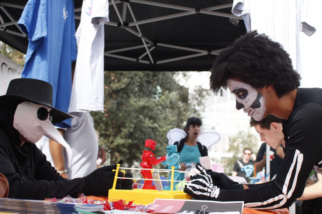 The Active Minds booth had literature about the club, candy, and rock 'em sock 'em robots at the Halloween Escape event at Palomar College, Oct. 30. Angela Marie Samora/The Telescope
