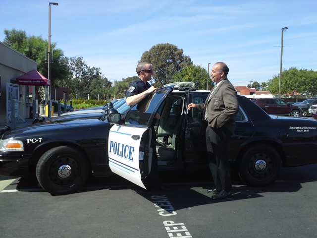 Palomar Police Chief Mark DiMaggio checking up with Officer Stephen Wilson in front of the college's Police Department on Oct. 14. Photo: Emily Rodriguez/The Telescope