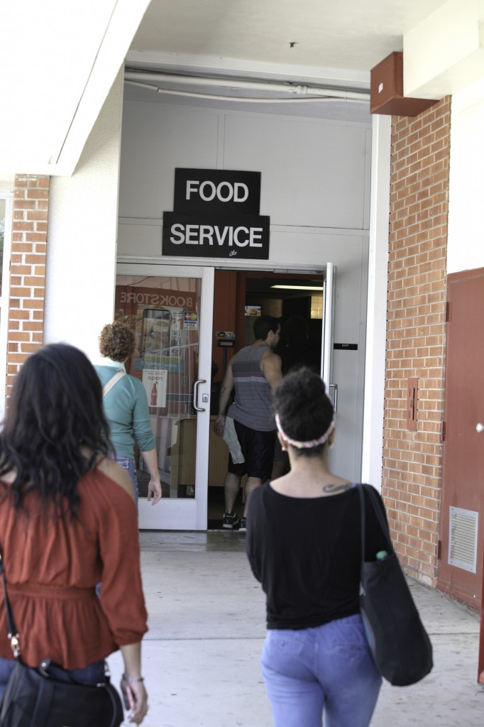 Students file through the cafeteria entrance doors at Palomar College San Marcos Campus October 8, 2014. Erika Shasky/The Telescope