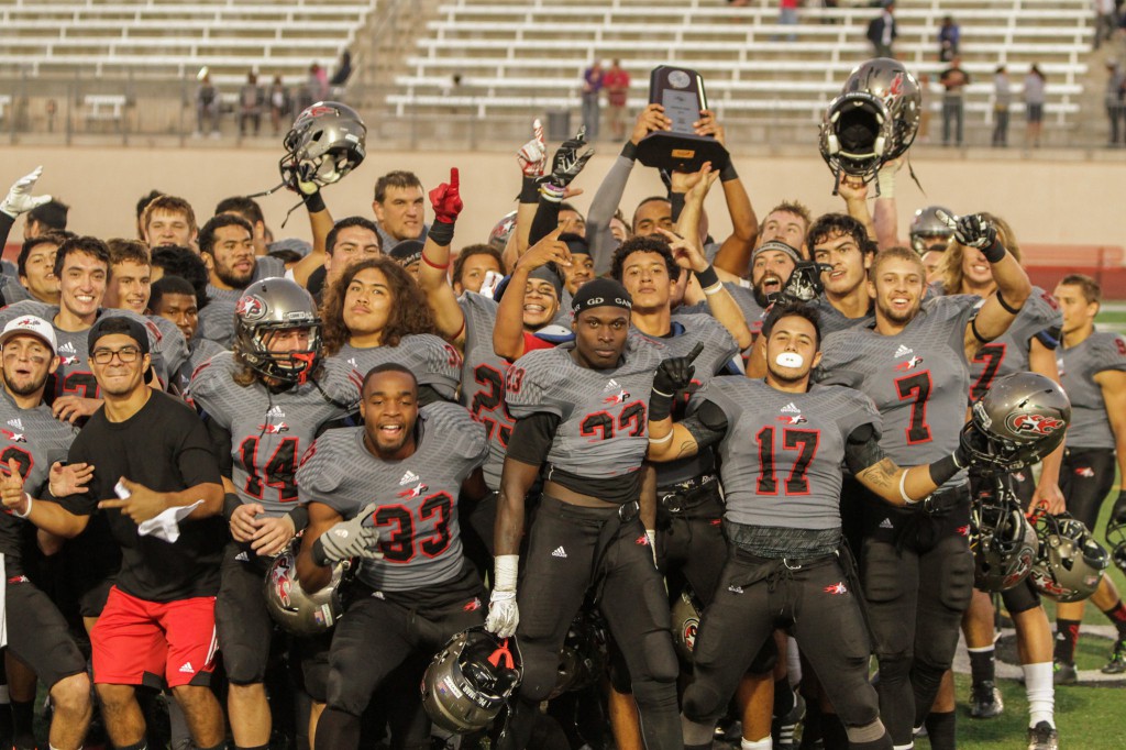 November 22, 2014 |Palomar Football team celebrates after winning the Patriotic bowl against Glendale College. The Comets defeated the Vaqueros 30-22 and finish the season7-4 . The game was held at Escondido HS, in Escondido California.| Photo Credit: Philip Farry | The Telescope