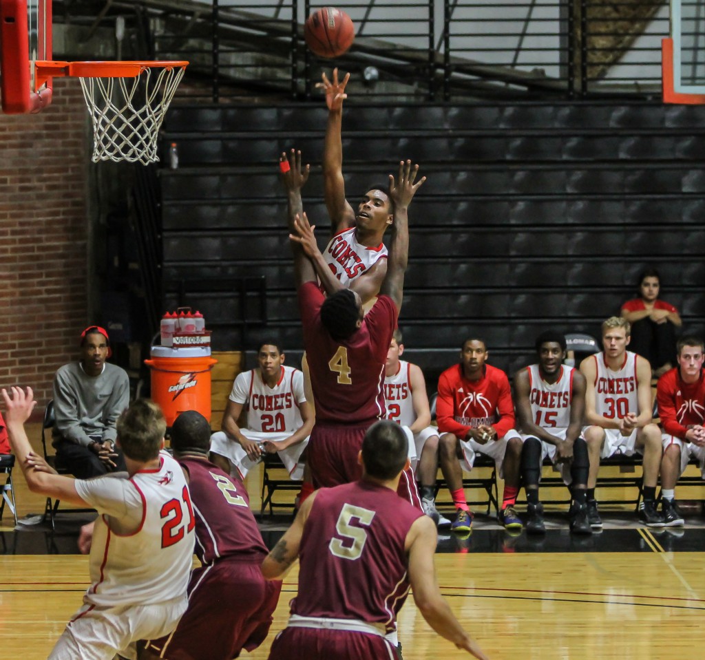 November 28,2014 | Palomar Forward #23 Jeremy Franklin scores 2 pts with a hook shot during the second half against Southwestern College. The Jaguars beat the Comets 52-50 Saturday night at the Dome. Palomar is hosting its 10th annual Thanksgiving Tournament. Photo: Philip Farry | The Telescope