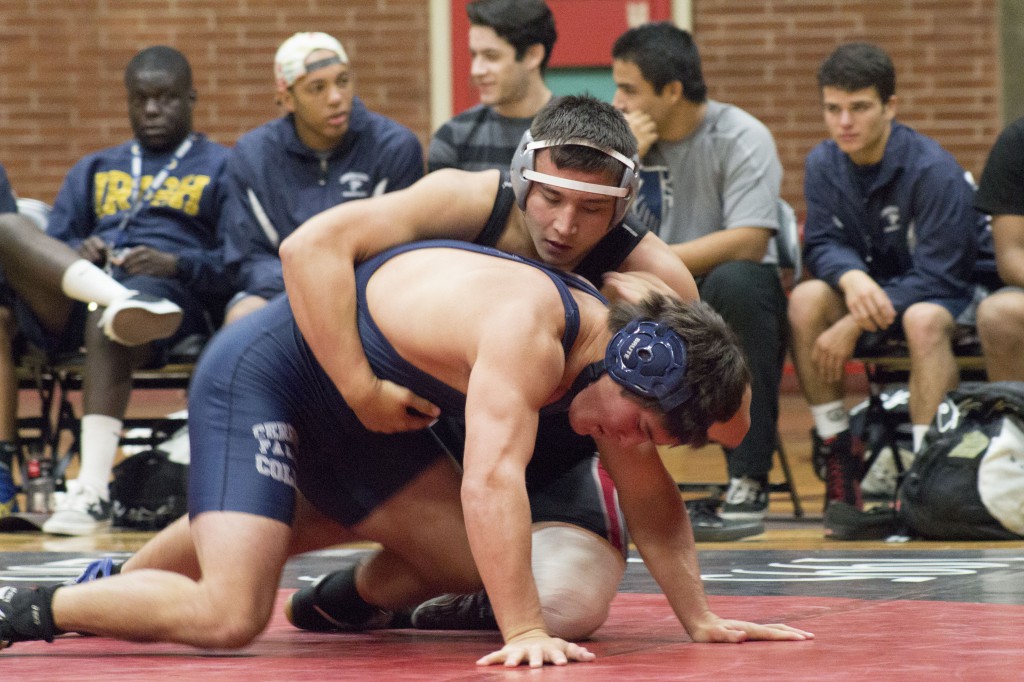 November 5, 2014, Palomar College San Marcos, Calif. Alex Graves on the mat with opponent Cerritos College Falcon Max Kumashiro. Graves wins the match - Palomar 7, Cerritos 3. Photo by Paul Nelson|The Telescope