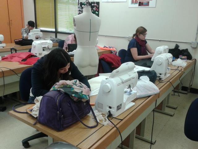 Students work on their designs at sewing machines during class on Nov. 14. Hayley Ulle/ The Telescope