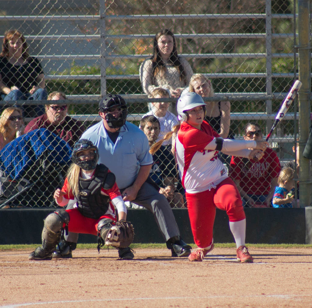 Palomar College Softball San Marcos, Calif. Kali Pugh hits a ball pitched by Alumni Pitcher Jessica Zanie jenkins. (Paul Nelson/The Telescope)