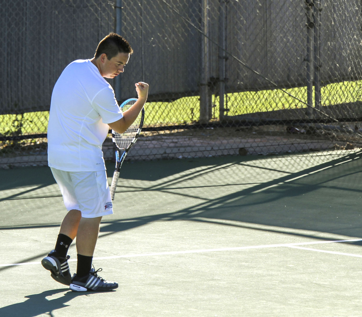 Feb. 12, 2015 | Palomar tennis player Vince Rivera celebrates winning a point during the first set. The Comets hosted visiting Mt. San Jacinto college. The Eagles beat the Comets 6-3 Thursday afternoon on the Comets courts. (Philip Farry/The Telescope)