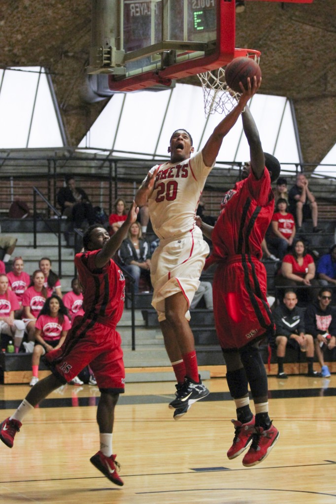 February 11, 2015 | Palomar guard #20 Deven Riley scores two of his twelve points against visiting Mt. San Jacinto at the Dome in the Coaches vs Cancer doubleheader. The Eagles beat the Comets 76-69. Photo by Philip Farry / The Telescope