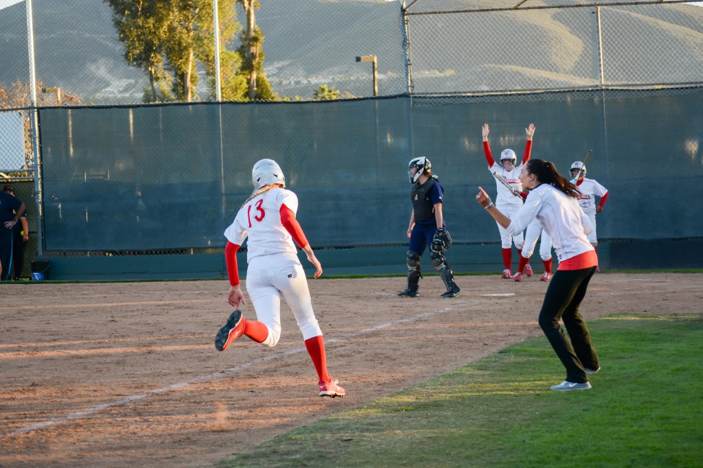 February 11, 2015 | Stephanie Koishor (13) rounds third on her way to scoring in the sixth inning of the Comets 12-2 victory over the visiting San Diego Mesa College Olympians. Photo by Seth Jones.