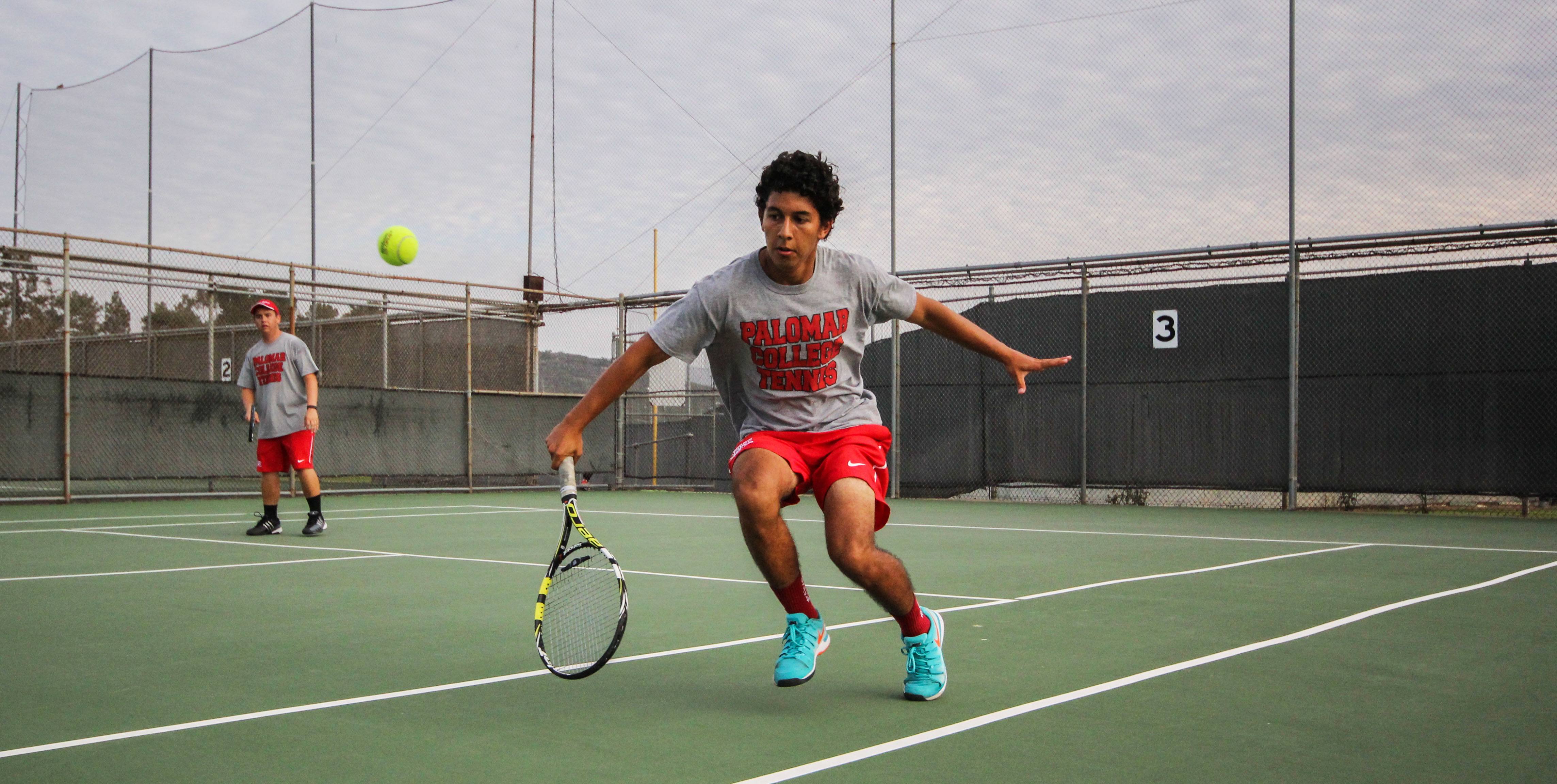 Palomar College Tennis players Jonathan Rodriguez and Vince Rivera won their Men's Doubles match against San Diego City College after playing a third set that ended 10-3, Feb 19, 2015. (Dirk Callum/The Telescope)
